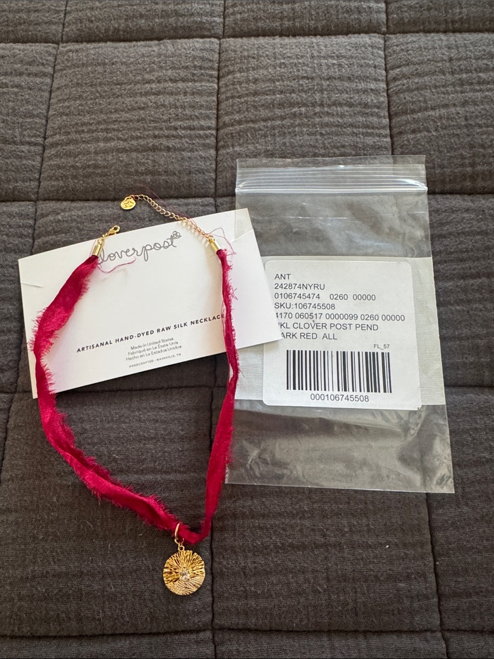 Anthropologie Dark Red Silk Necklace with Gold Sunburst Pendant